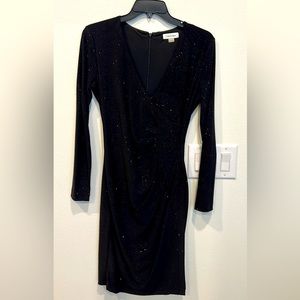 Very flattering black formal dress.